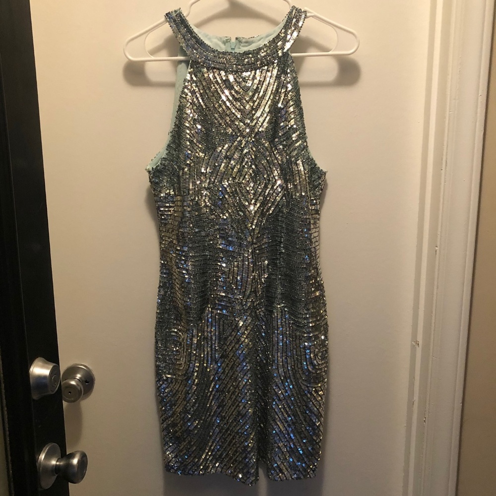 Sparkly, silver sequin dress with halter neck